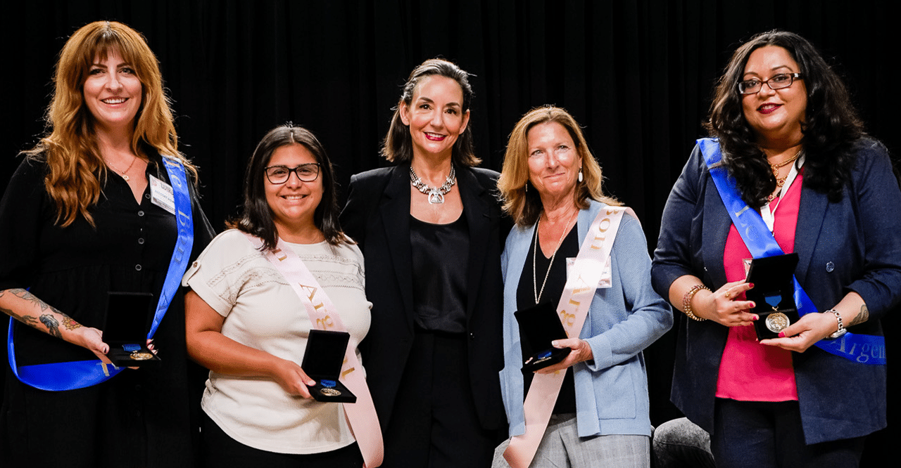 Resilience Award winners posing with Kai Stearns Davis