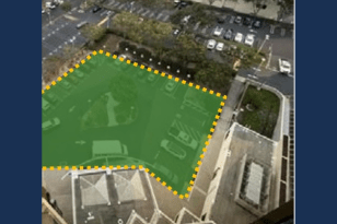 rendering of proposed green space area where a parking lot is now