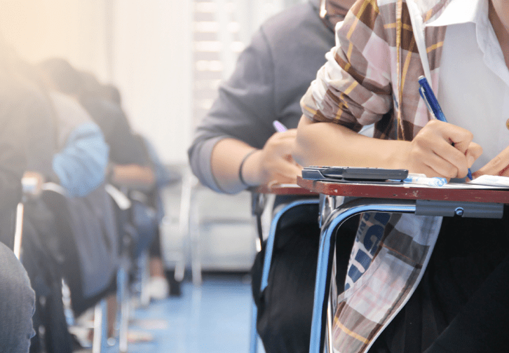 students sitting at classroom desks