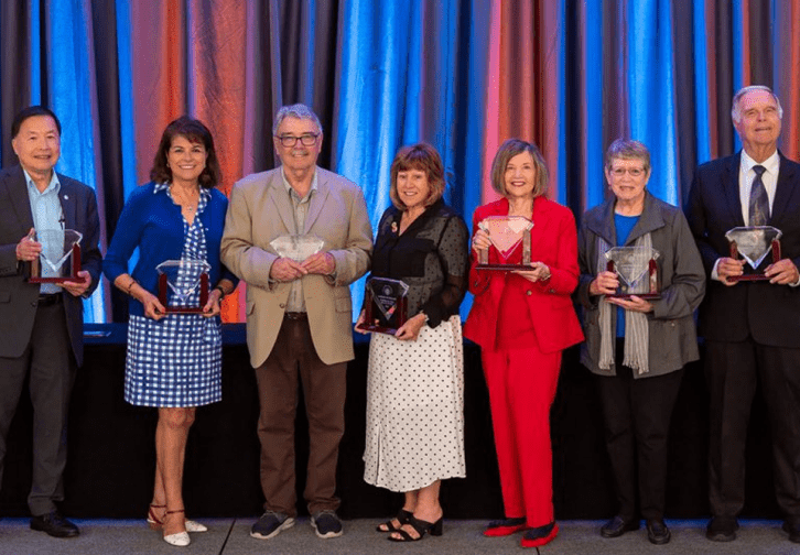 Dr. Barbara Dunsheath with the other six Trustee winners