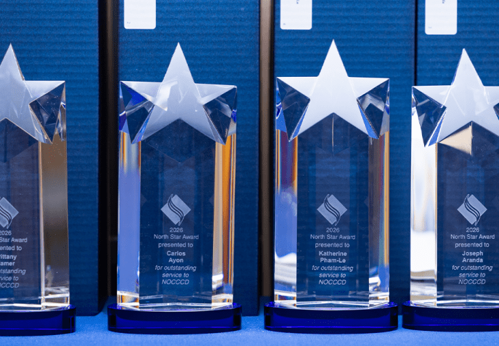 Four glass trophies