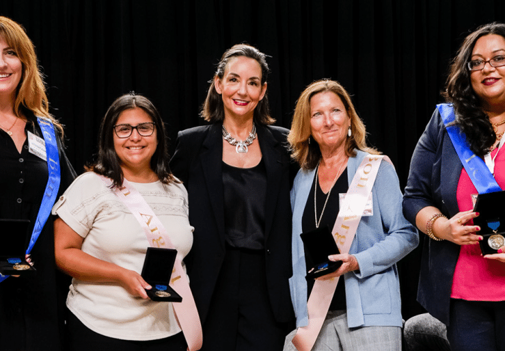 Resilience Award winners posing with Kai Stearns Davis