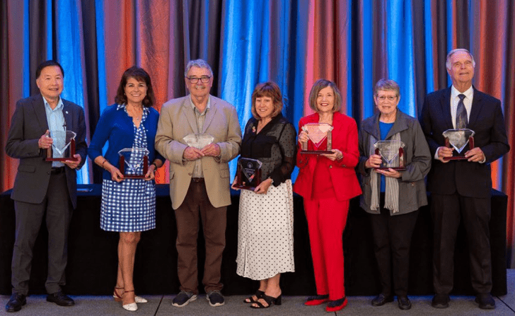 Dr. Barbara Dunsheath with the other six Trustee winners