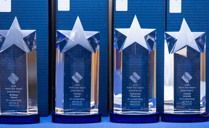 Four glass trophies