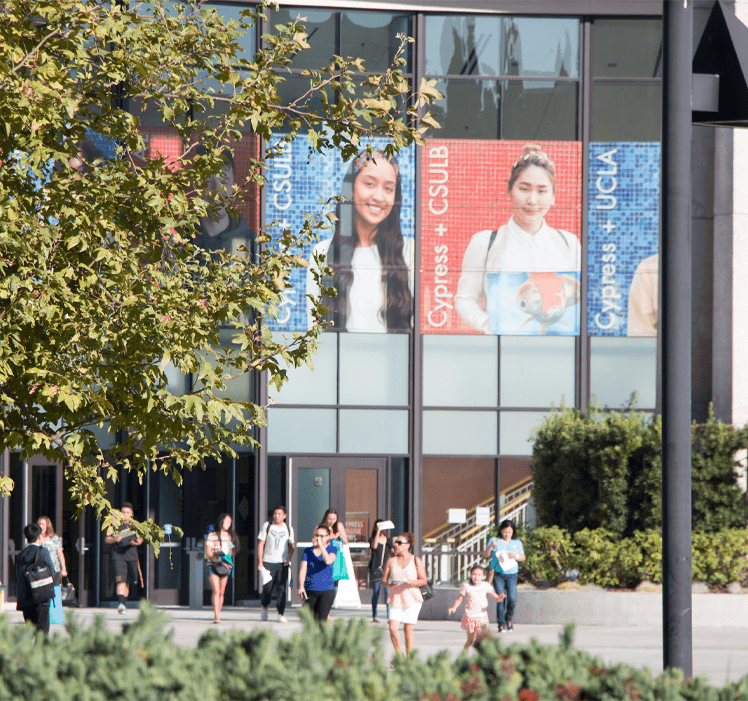 students walking outside at Cypress College