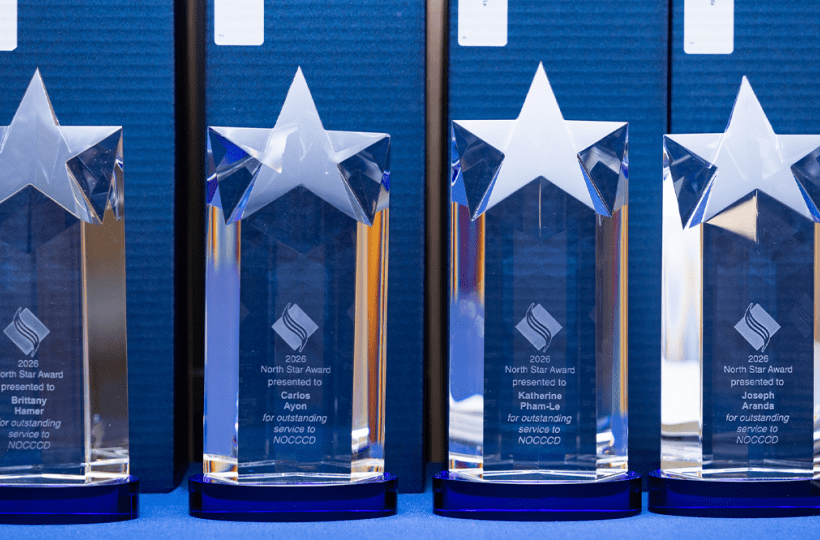 Four glass trophies